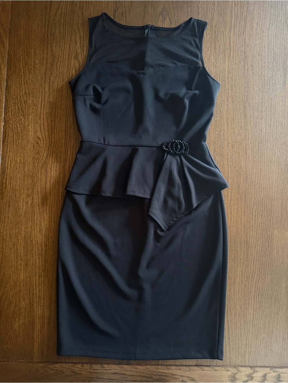 Enfocus Studio Black Sleeveless Peplum Dress with Brooch Detail
